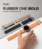 Watch Lug 20mm | Rubber One Bold Band - A hand holds a watch with an orange band, with beige and black bands displayed nearby.