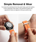 Watch Lug 20mm | Rubber One Bold Band - Hands detaching a bright orange watch band and fastening it on a wrist.