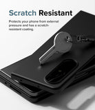 Galaxy Z Fold 4 Case | Slim - A metal key resting on a black phone case, demonstrating scratch-resistant protection.