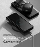 Galaxy Z Fold 4 Case | Slim - Folded phone in black case charging wirelessly with earbuds case resting on top.