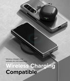 Galaxy Z Fold 4 Case | Slim - Folded phone in clear case on wireless charger with earbuds case on top, showing 100% charge.