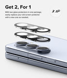 Galaxy Z Fold 5 | Camera Protector Glass [2 Pack] - Two glass camera protectors hovering above a Galaxy Z Fold 5 phone.
