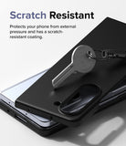 Galaxy Z Fold 5 Case | Slim - A metal key rests on a black phone case, demonstrating its scratch-resistant surface.