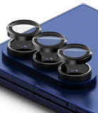 Galaxy Z Fold 7 | Camera Lens Frame Glass (2 Pack) - Three black protective glass lens covers hovering above the triple camera array of a blue smartphone.