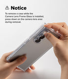 Galaxy Z Fold 7 Case | Fusion - Hands pressing down on the camera lens area to remove a clear phone case.