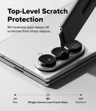 [Bundle] Galaxy Z Fold 8 Ultra | Fusion Magnetic + Camera Lens Frame Glass (2P) - A utility knife blade presses against a phone camera lens protector, demonstrating 9H scratch resistance.