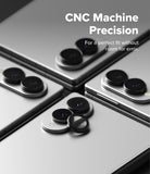 Galaxy Z Fold 8 | Fusion Air Flap Magnetic + Camera - Close-up of a smartphone camera module with a circular lens protector removed and placed beside it, overlaid with the text 'CNC Machine Precision' and 'For a perfect fit without room for error.'.