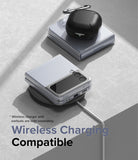 Galaxy Z Flip 4 Case | Slim - Folded phone in a clear case on a wireless charger with earbuds case on top.