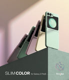 Galaxy Z Flip 5 Case | Slim Color - Four Galaxy Z Flip 5 phones in various pastel colors standing on a dark ledge.
