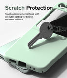 Galaxy Z Flip 5 Case | Slim Color - A metal key resting on a light green phone case to demonstrate scratch resistance.
