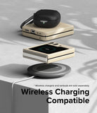 Galaxy Z Flip 5 Case | Slim Color - Folded phone in a beige case hovering over a wireless charger with earbuds on top.