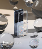 Galaxy Z Flip 6 Case | Fusion Design - Clear floral phone case standing next to a blue Galaxy Z Flip 6 among glass spheres.