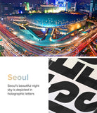 Galaxy Z Flip 7 FE Case | Fusion Design - Seoul night cityscape with light trails beside a close-up of bold, black typography.