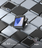 Galaxy Z Flip 6 Case | Slim - A black slim case on a folded Galaxy Z Flip 6, centered over a grid of metallic phone tiles.