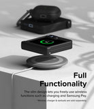 Galaxy Z Flip 7 FE Case | Slim Hinge - Folded phone in a black case wirelessly charging on a pad with earbuds nearby.