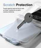Galaxy Z Flip 7 FE Case | Slim Hinge - A metal key resting on a clear phone case, demonstrating scratch-resistant protection.