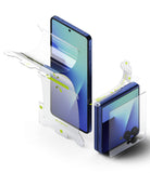 Galaxy Z Flip 7 Screen Protector | 3-in-1 Protector Pro - 3-in-1 film application process for an unfolded and folded blue smartphone.