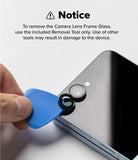 Galaxy Z Flip 7 | Camera Lens Frame Glass (2 Pack) - - Hand using a blue plastic tool to carefully remove a camera lens protector from a smartphone.