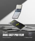 Galaxy Z Flip 7 Screen Protector | Dual Easy Pro Film (2 Pack) - A Galaxy Z Flip 7 with an installation tool and film hovering over a gray surface.
