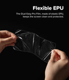 Galaxy Z Flip 7 Screen Protector | Dual Easy Pro Film (2 Pack) - Hands holding a flexible, transparent EPU screen protector film against a black background.