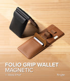 Galaxy Z Flip 7 Cover | Folio Grip Wallet Magnetic - Black magnetic folio case on a folded phone and an open tan leather wallet with a finger strap.