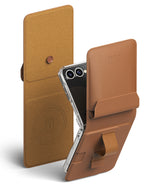 Galaxy Z Flip 7 Cover | Folio Grip Wallet Magnetic - Tan leather folio wallet case with a magnetic strap and finger grip holding a clear phone case.