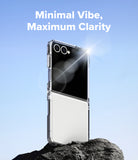 [Bundle] Galaxy Z Flip 7 Clear | Fusion - Bundle Galaxy Z Flip 7 Clear | Fusion - Clear phone case on a Galaxy Z Flip 7 standing on a rock against a blue sky.