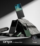 Galaxy Z Flip 7 Case | Onyx - Black Onyx cases for Galaxy Z Flip 7 displayed on jagged rocks against a dramatic backdrop.