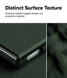 Galaxy Z Flip 7 Case | Onyx - Close-up of a dark green, textured phone case with a rugged, matte finish and metallic side button.