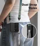 Galaxy Z Flip 7 Case | Onyx Magnetic - Person wearing a phone case with dual strap holes and a green lanyard.