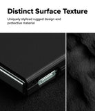 Galaxy Z Flip 7 Case | Onyx Magnetic - Close-up of a black phone case with a rugged, textured surface and metallic button.