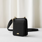Galaxy Z Flip Case | Folio Signature Black - Black textured leather folio case with gold hardware and shoulder strap.