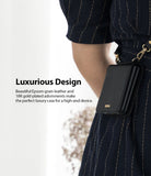 Galaxy Z Flip Case | Folio Signature Black - Black textured leather phone case with gold hardware worn on a strap.
