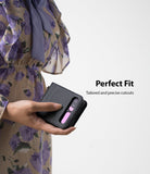 Galaxy Z Flip Case | Folio Signature Black - Hand holding a black textured folio case for a Galaxy Z Flip phone.