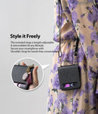 Galaxy Z Flip Case | Folio Signature Black - Black leather phone case with shoulder strap worn over floral dress.