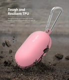 Galaxy Buds / Galaxy Buds+ Case - Pink - Pink TPU case for Galaxy Buds with a carabiner, shown hitting dirt and debris.