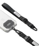 Holder Link Tactical Cam Buckle Hand Strap - A black nylon phone strap with a quick-release plastic buckle and metal carabiner, shown attached to a clear smartphone case on a white background.