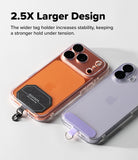Holder Link Tactical Cam Buckle Hand Strap - Two clear phone cases with integrated orange and lavender grip tabs are shown on iPhones against a light gray background, with text reading '2.5X Larger Design' and a descriptive feature callout.
