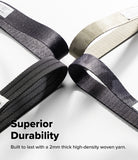 Holder Link Tactical Cam Buckle Hand Strap - Four woven webbing straps in black, gray, and off-white, arranged in a star-like pattern on a white background with the text 'Superior Durability' and 'Built to last with a 2mm thick high-density woven yarn.'.