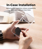 Holder Link Tactical Cam Buckle Hand Strap - Person holding a clear phone case with adhesive-free installation feature on a wooden surface.