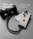 Holder Link Strap | Clear - A grey rope strap attached to a clear phone case, resting next to a dumbbell on a grey surface.