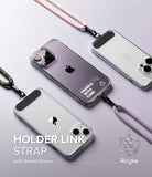 Holder Link Strap | Clear - Three clear phone cases with colorful lanyards attached to black mounting tabs on a purple background.