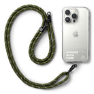 Holder Link Strap | Clear - Khaki rope lanyard with reflective accents attached to a clear phone case with Handle With Care text.