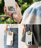 Ringke Strap Holder Link Design - Clear phone case with sticker-adorned strap holder attached to a lanyard.