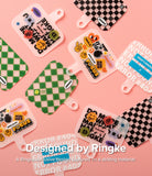 Ringke Strap Holder Link Design - Assorted translucent phone strap holders with colorful stickers and patterns on a pink background.