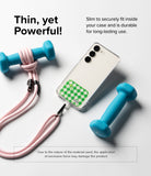 Ringke Strap Holder Link Design - A phone in a clear case with a green checkered strap holder attached to a pink lanyard.