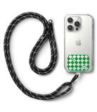 Ringke Strap Holder Link Design - Black rope lanyard with white flecks attached to a clear phone case with a green checkered sticker.