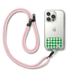 Ringke Strap Holder Link Design - Pink rope lanyard attached to a clear iPhone case with a green and white checkered card.
