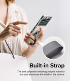 Galaxy Z Flip 6 / 5 / 4 / 3 | Hinge Cover - Person holding a phone with a grey polyester webbing strap and metal ring.