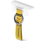 Galaxy Z Flip 7 FE / 6 / 5 / 4 / 3 | Hinge Cover Tarpaulin - Galaxy Z Flip 7 FE / 6 / 5 / 4 / 3 | Clear hinge cover with a yellow "DANGER" warning strap and silver metal ring.